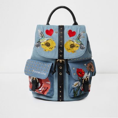 Light blue denim embroidered backpack